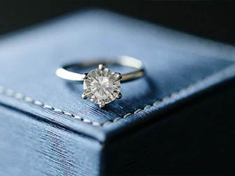 Signet diamond ring on box
