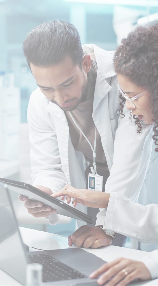 Two researchers reviewing their findings