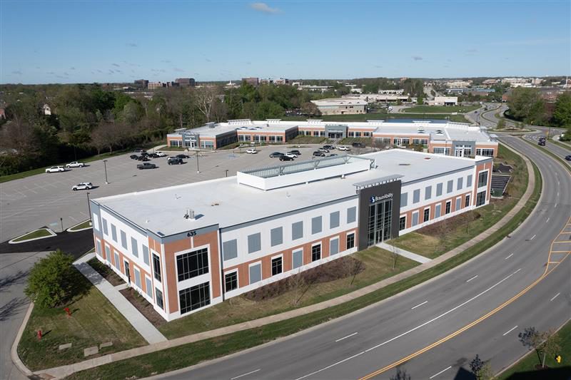 BraunAbility employees with WAV open infloor ramp