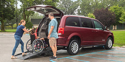 family with a BraunAbility dodge grand caravan Rear Entry wheelchair van