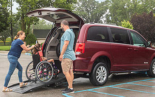 family with a BraunAbility dodge grand caravan Rear Entry wheelchair van