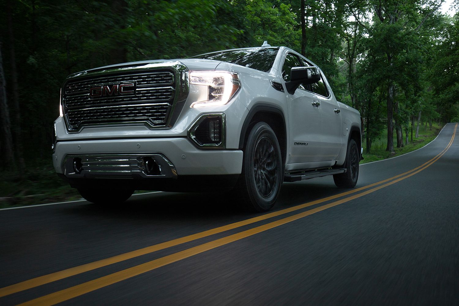 gmc-truck-driving-on-the-road-with-bridgestone-alenza-tires