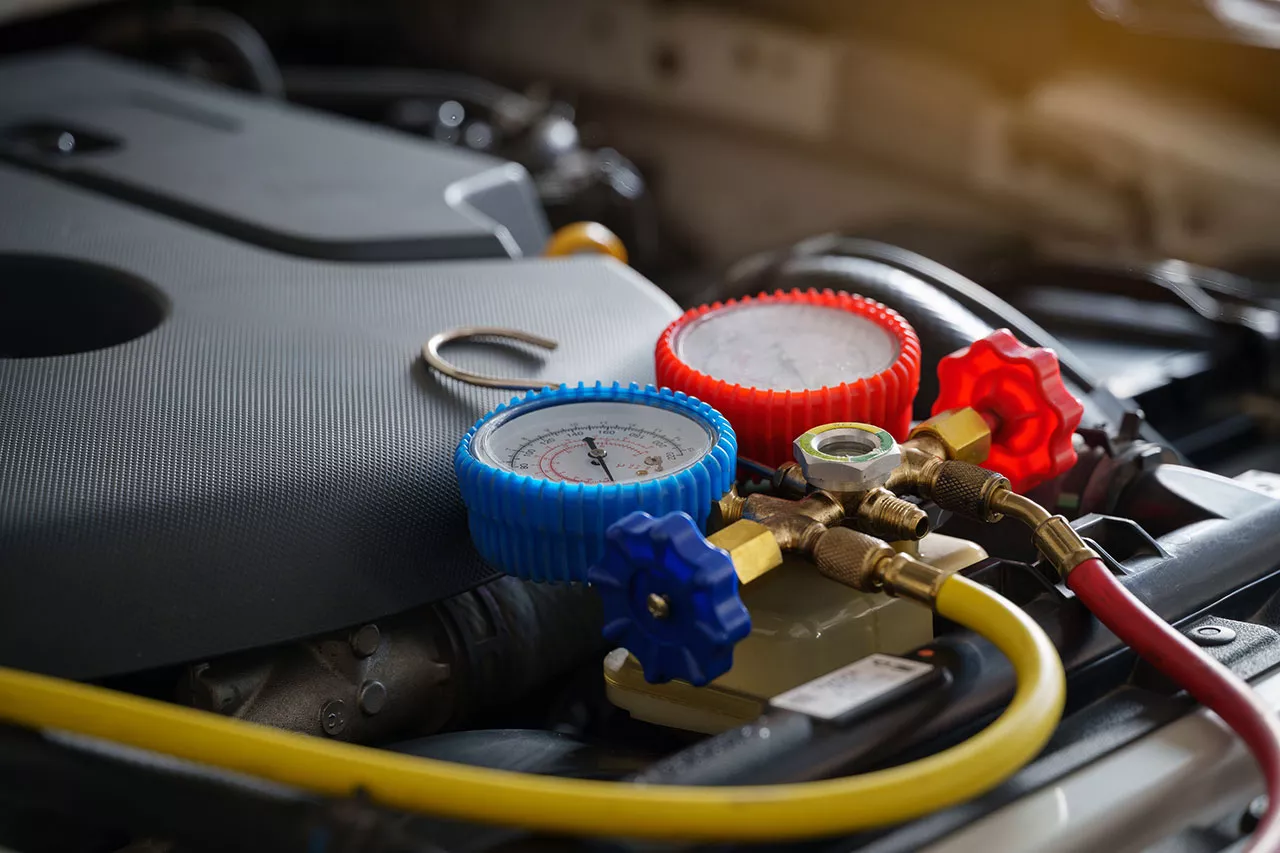 Air conditioning gauage set ready for use to test a vehicle cooling system.