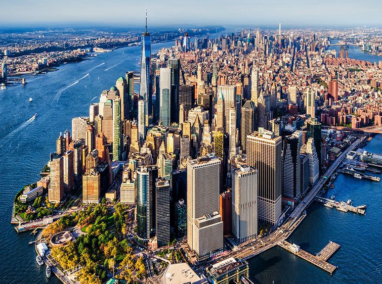 Aerial view of Manhattan Island with NYC skyline