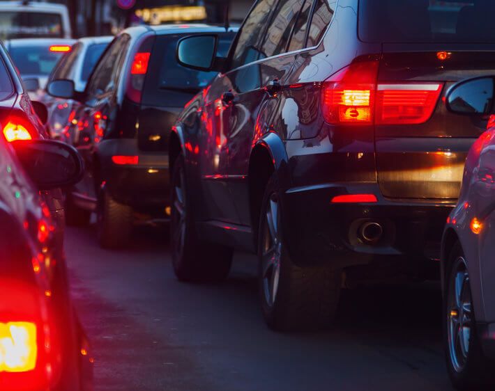 Line of cars, brake lights in traffic