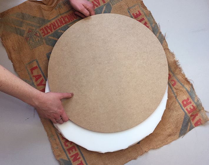 Assemble plywood, foam, and burlap to make a cushion