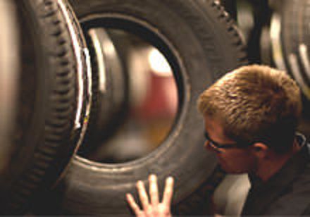 Tire inspection at Firestone Complete Auto Care