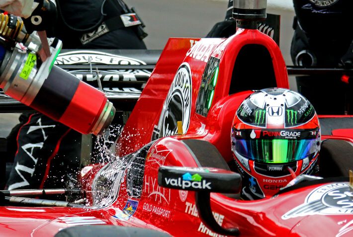 Closeup of red INDYCAR race car during pit stop