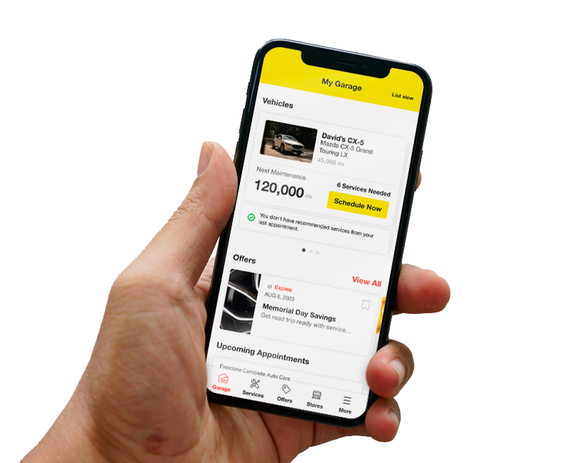 A customer using the Tires Plus app on their phone. The app shows mainenance schedule, offers, and upcoming appointments.