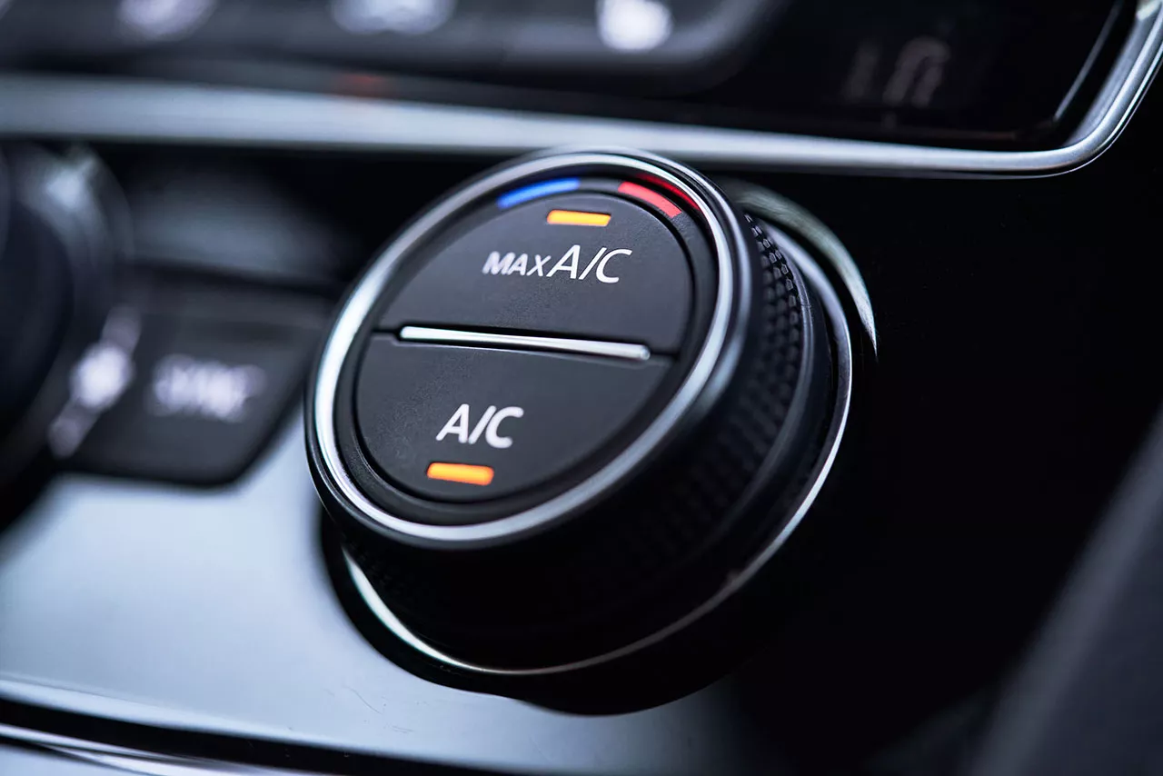 Lit up control dial for a car air conditioning system.