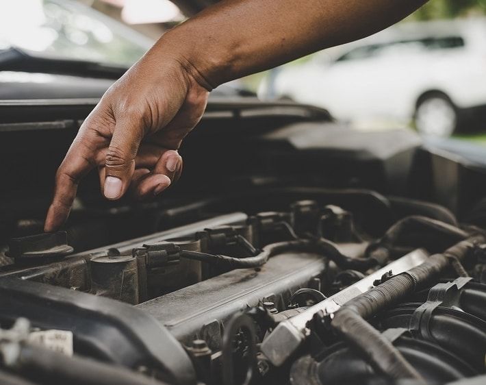 Man pointing to engine