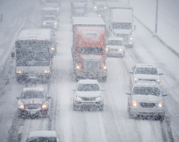 Heavy traffic on a snowy highway