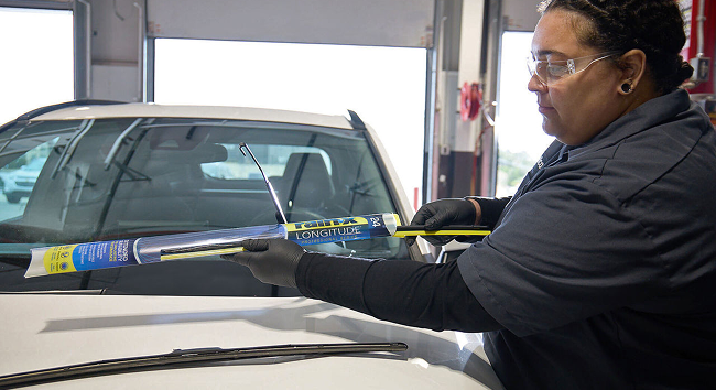 Technician installs a set of Rain-X windshield wipers.
