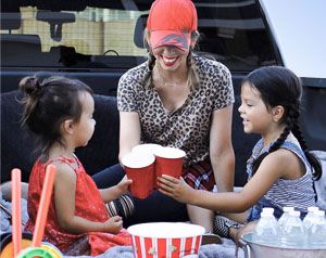 Family tailgating in the back of a truck