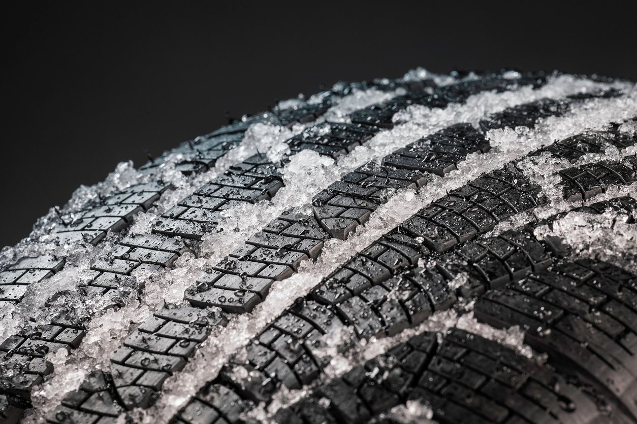 image of winter tire in ice