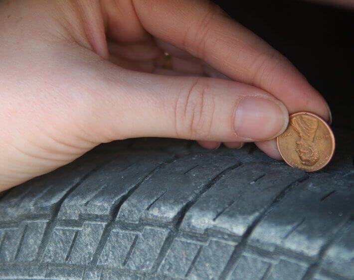 Got a Minute How to Check Tire Tread Depth with a Penny