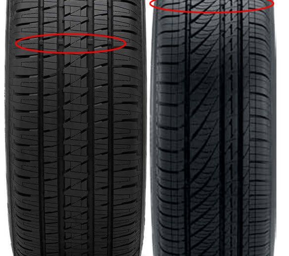 Tread wear bar on new tire circled in red