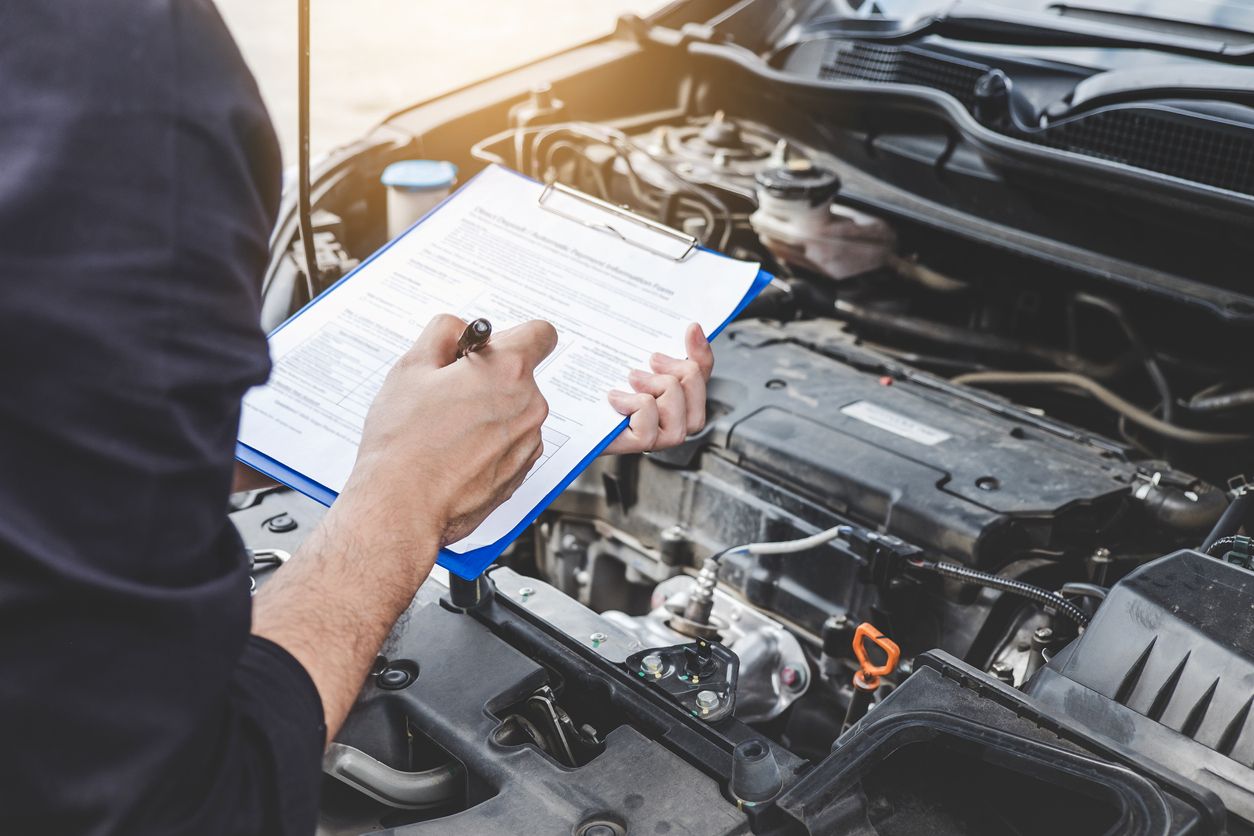 mechanic doing vehicle inspection