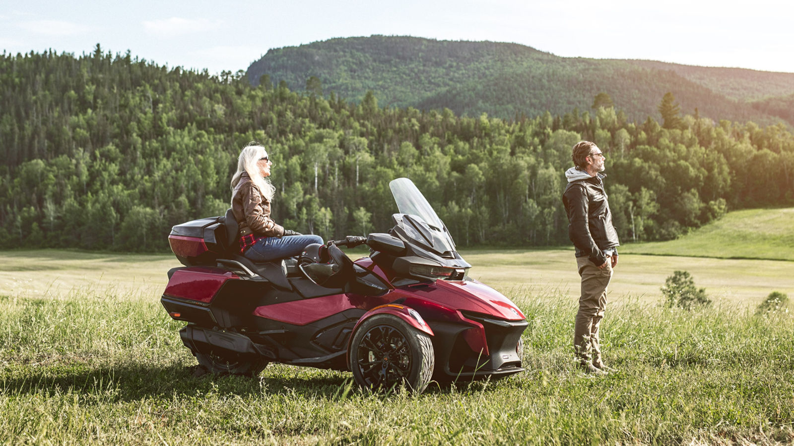 Person sitting on Can-Am Spyder RT with riding companion
