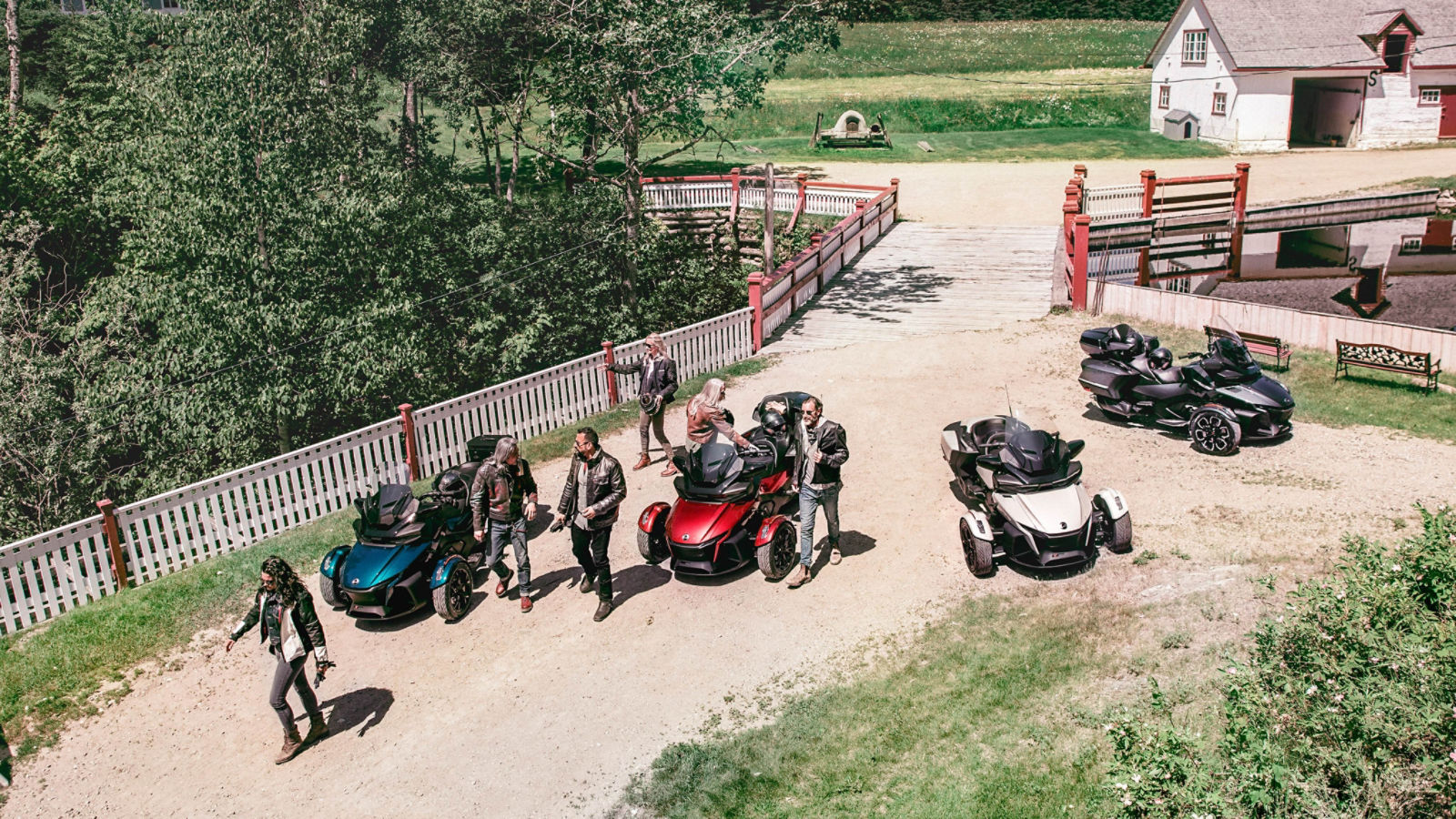 Overhead shot of friends at the farm with Can-Am Spyder RT Vehicles