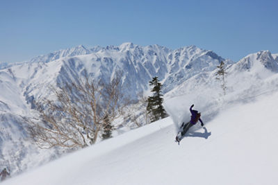 Snowboarding down a hill