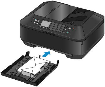 shows lower paper tray being pushed back into machine