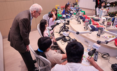 Seymour Liebman of Canon with patients playing bingo