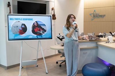 NYMRC staff on microphone sharing insights