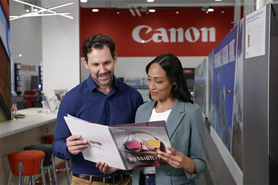 two people looking at brochure