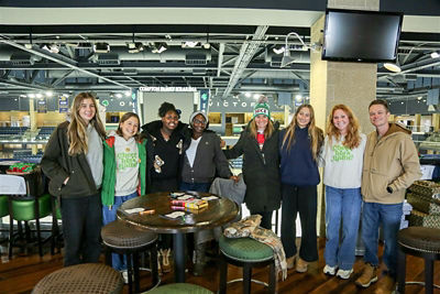 Canon employees participating in Notre Dame Athletics’ annual gift-giving event, “A Brighter Christmas"