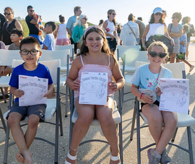Families attending the event received custom marine life coloring books, which were printed on the Canon imagePRESS V1000 digital press.