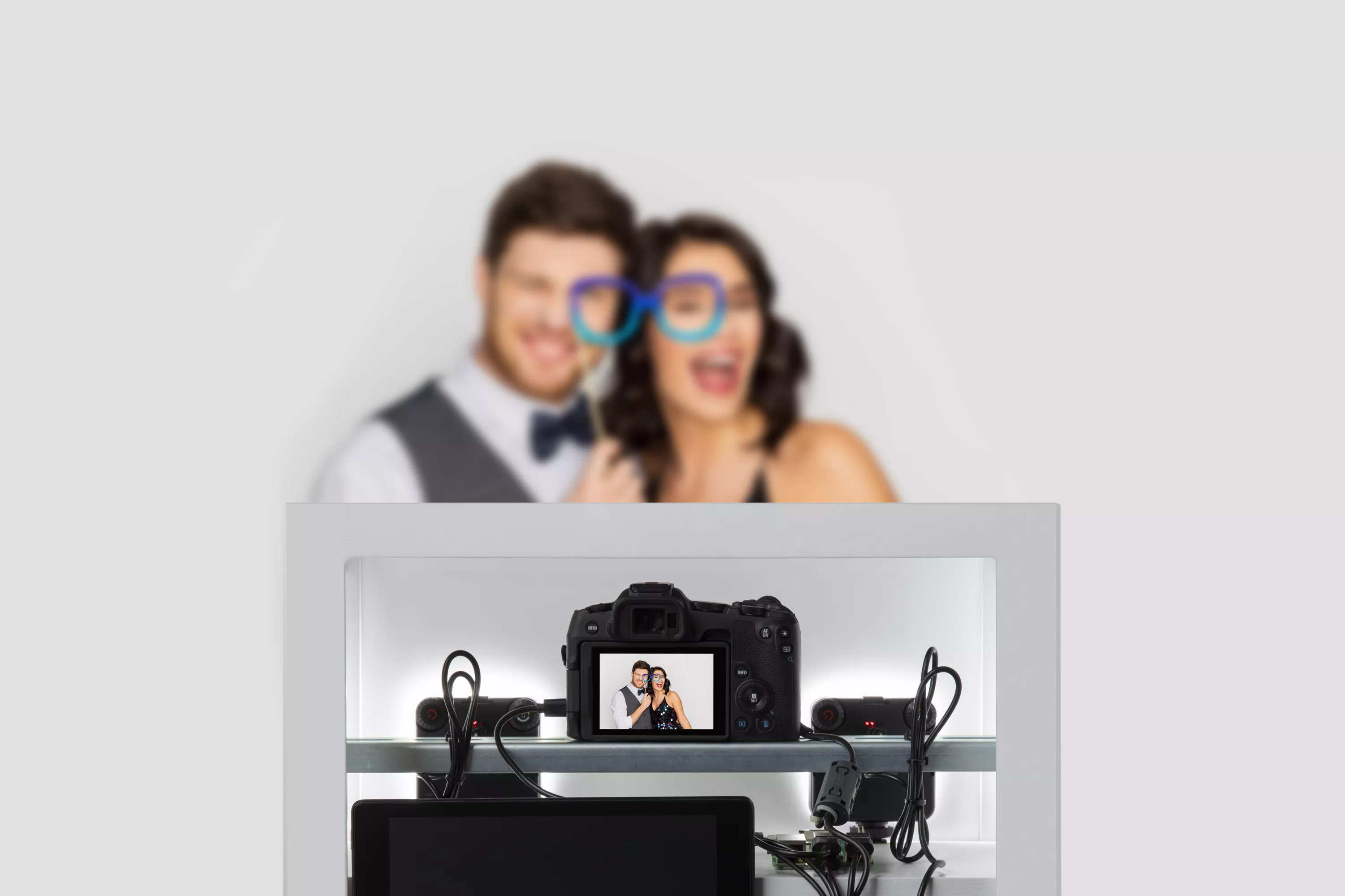People Posing In Front of a Camera Setup