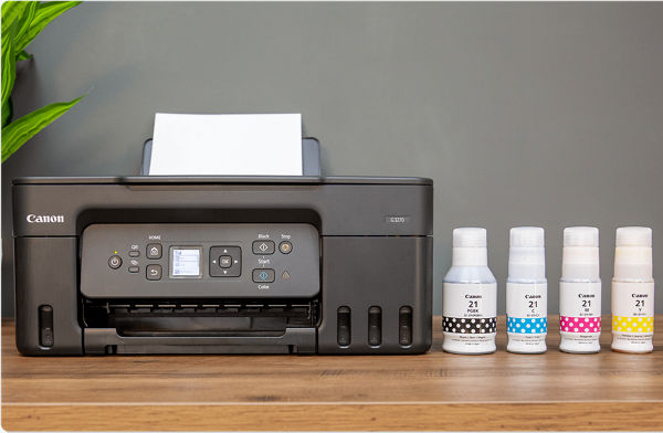 PIXMA G3270 - Printer next to Ink Bottles