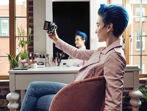 Woman holding a camera