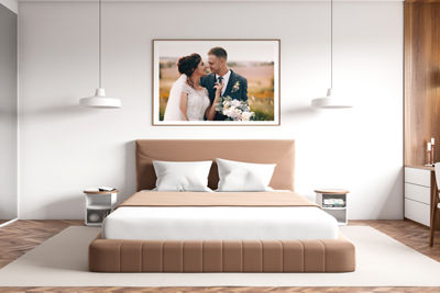 Wedding Portrait hanging on the wall in a bedroom