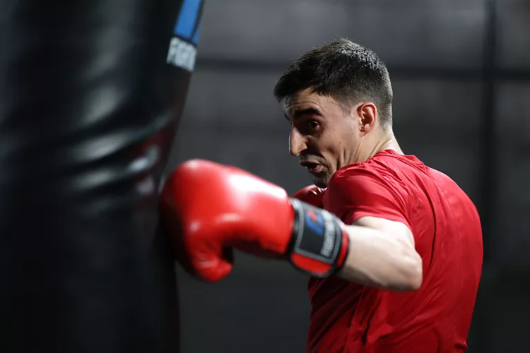 Boxer Punching Sandbag