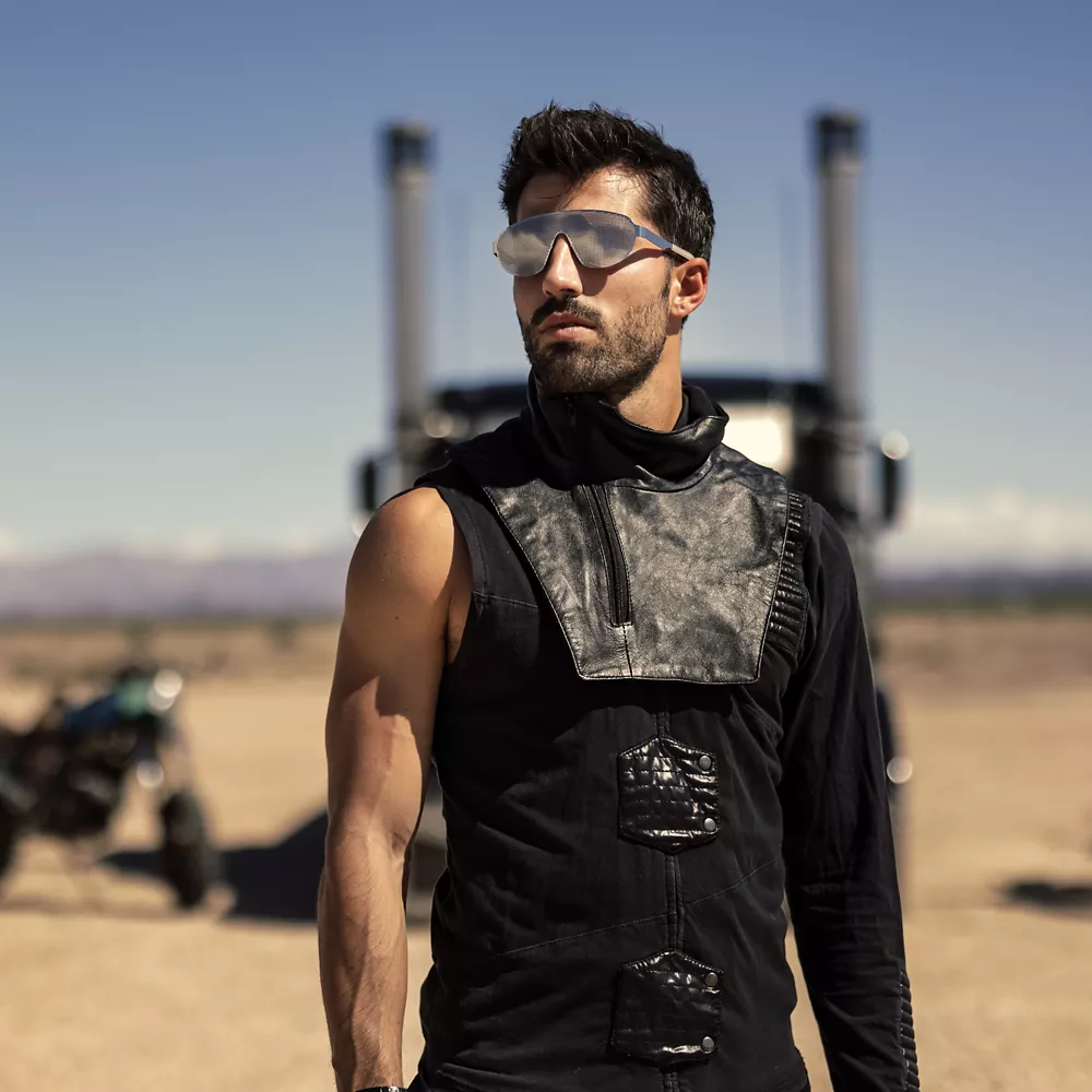 Motorcycle Rider Standing in a Desert