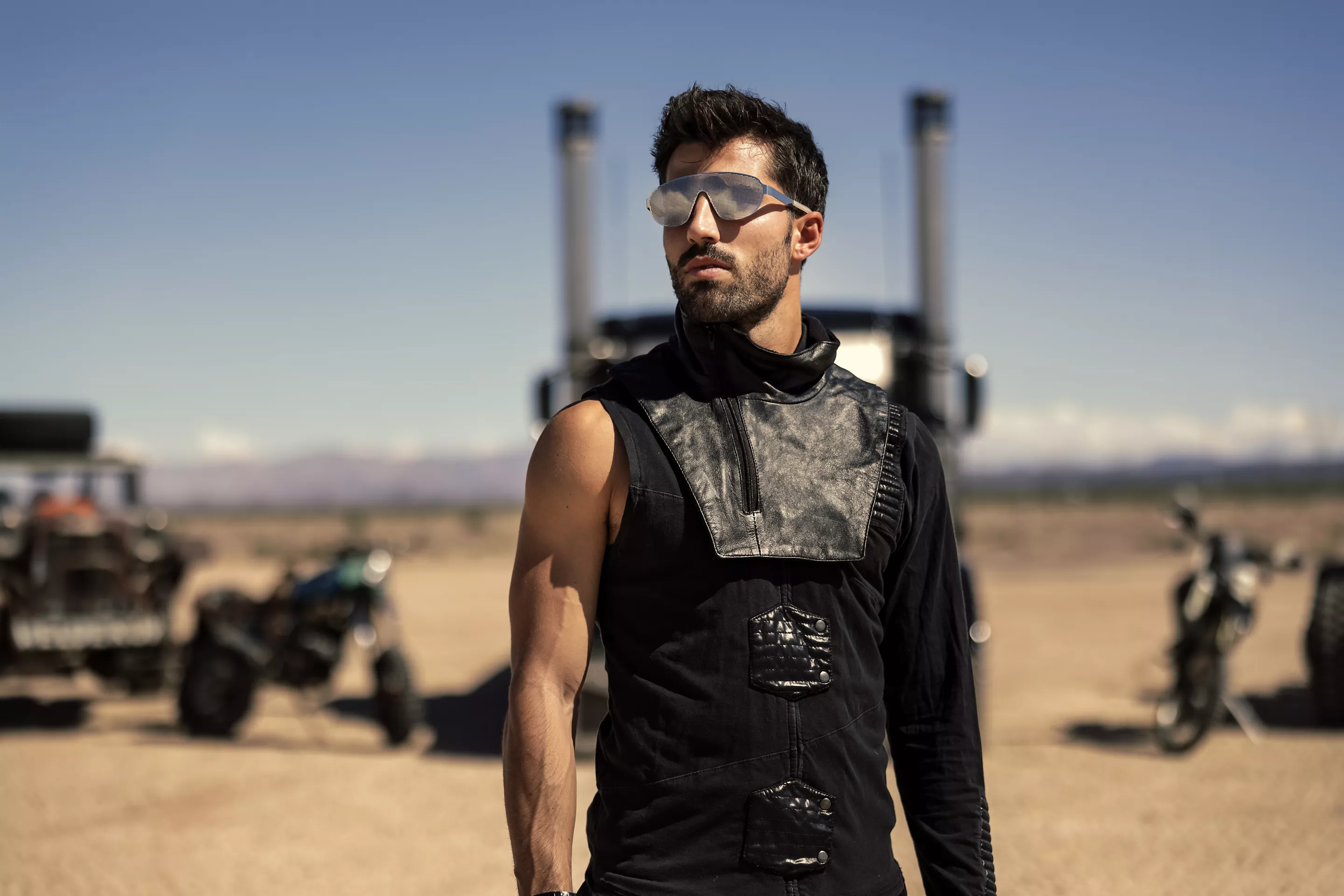 Motorcycle Rider Standing in a Desert