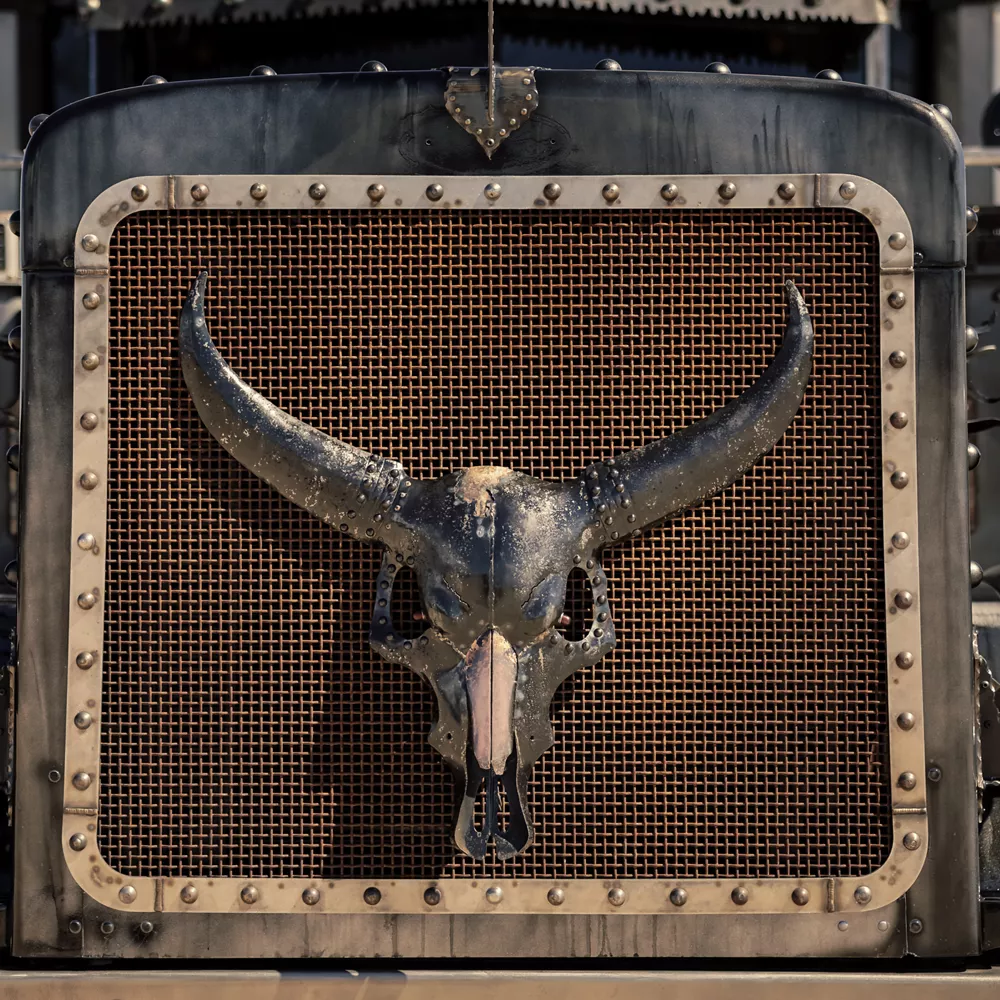 Truck with a Metal Bull Skull Attached in the Front