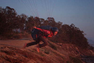 paraglider preparing to take off