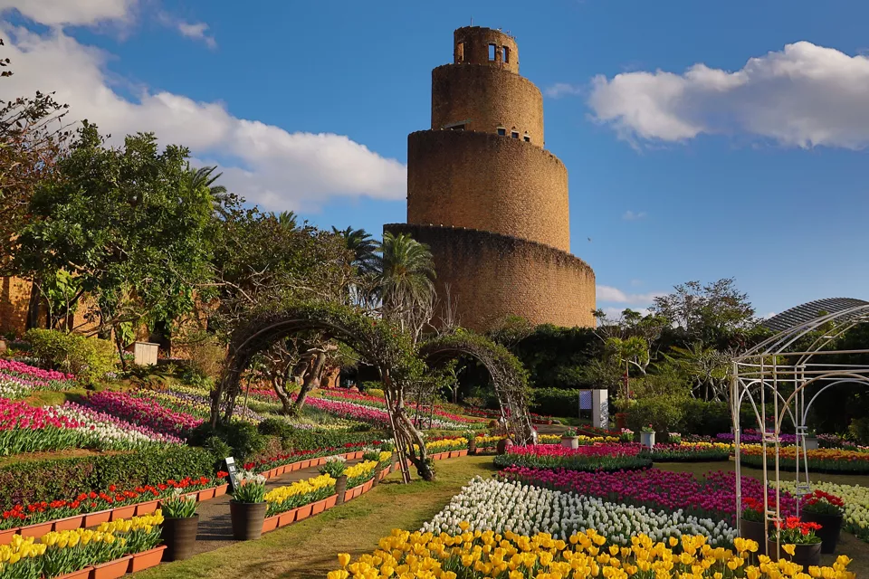 Field of Flowers and a Stone Monument