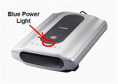 Power the scanner on using the power button or switch (8400F