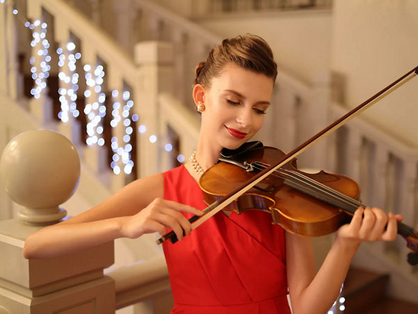  An individual playing the violin