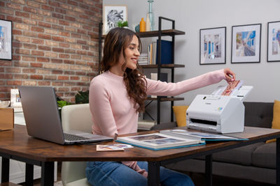 Person Using Canon Scanner
