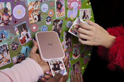 People Using IVY Printer to Print Stickers