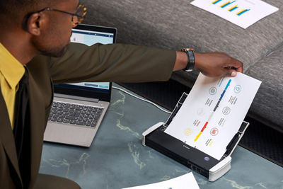 Person Using Canon Scanner