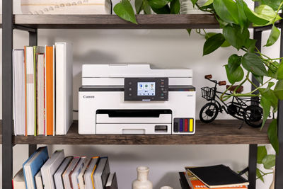 Canon Printer on a Book Shelf
