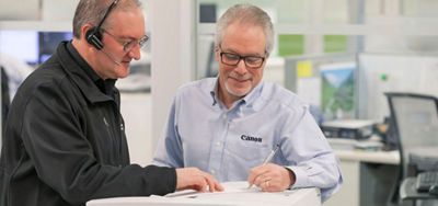 Service & Support employee with client