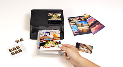 SELPHY CP1500 Printing Surronded by Other Printed Images