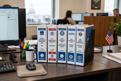 books on a desk in an office